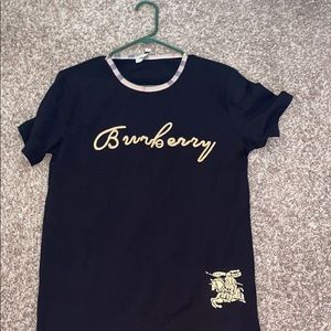 black burberry shirt with beige color and logo